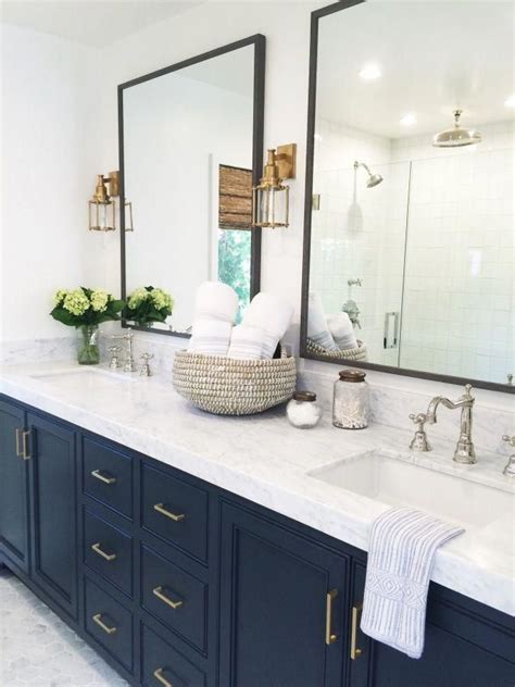 A minimalist bathroom with purple walls, a wooden floor and white appliances and a catchy shaped mirror. Navy Bathroom Decor | Teal And Grey Bathroom Decor | Blue Toilet Accessories 20190103 | Bathroom ...