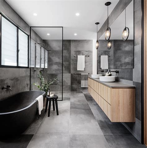 A Cloudy Grey Tile Sets The Palette For This Bathroom Modern Bathroom