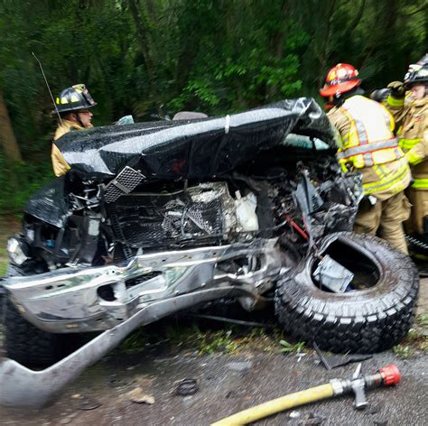 Woman trapped in vehicle after head-on collision near Bushnell
