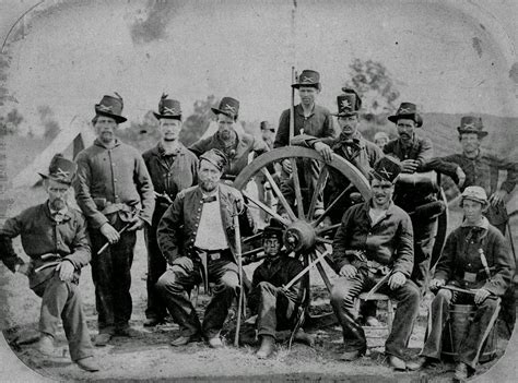 Union Soldiers Of Motts Artillery Posing With A Cannon In An