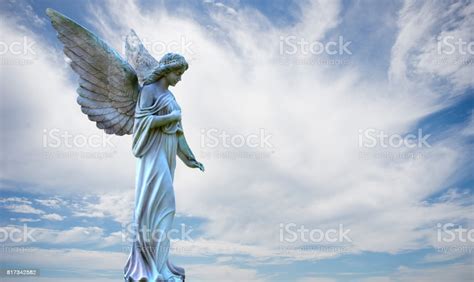 Beautiful Angel In Heaven Over Cloudy Sky Stock Photo