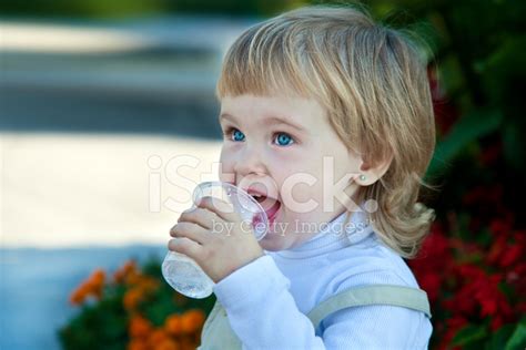 Baby Girl Drinks Water Stock Photo Royalty Free Freeimages