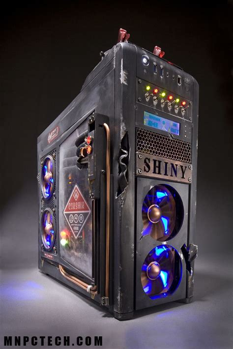 An Unusual Looking Computer Case With Lights On It