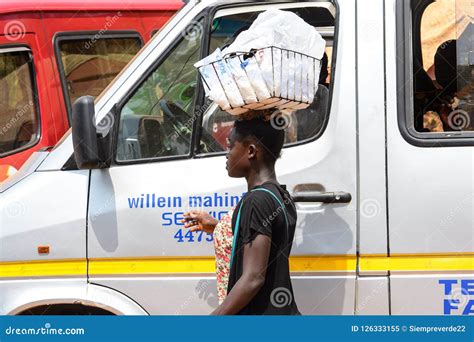 unidentified ghanaian woman carries a basket on her head in loc editorial image image of