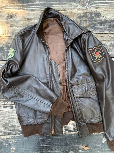 Leather Jacket With Arm Patches And Native American Back Patch As Is