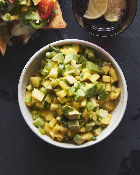 Bright and flavorful avocado strawberry mango salsa for dipping chips or adding to salads, tacos, fish, or chicken! Mango Avocado Salsa - What's Gaby Cooking