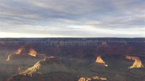 The Setting Sun Lights Up The Far Walls Of The Grand Canyon Stock