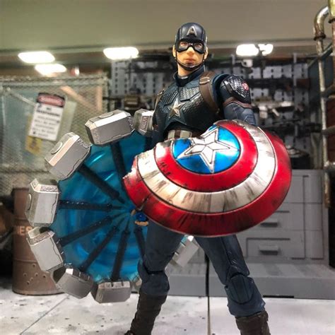 Captain America Holding The Thor Hammer