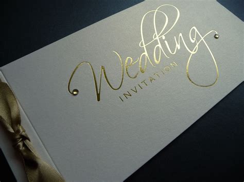 Invitation by double dipped calligraphy. Classic Ivory & Gold foiled cheque book Wedding Invitation | Wedding book, Book wedding ...