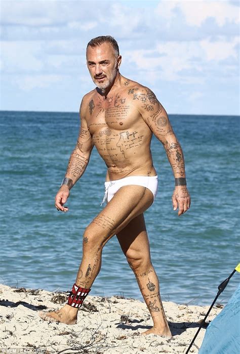 Italian Playboy Gianluca Vacchi Puts His Muscles Abs More On Display In Skimpy Swimwear On