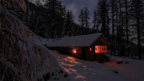 Snowy Cabin In The Winter Forest At Night Backiee