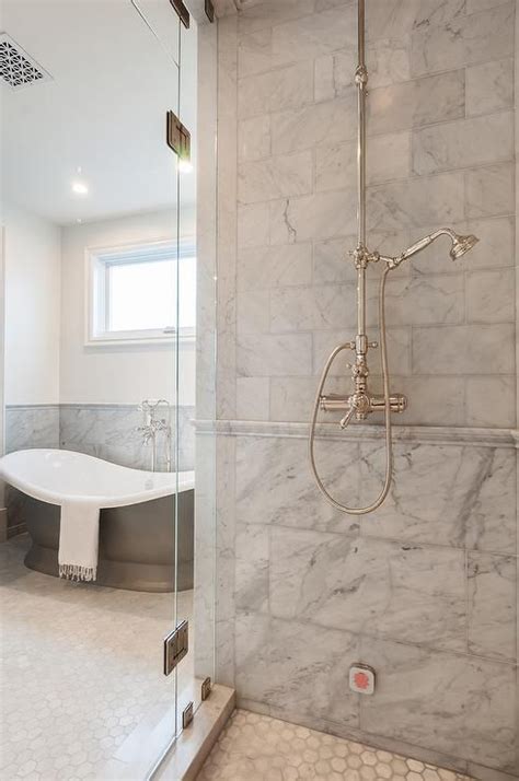 45 get it as soon as fri, aug 20 Walk-in shower featuring mixed gray marble shower tiles ...