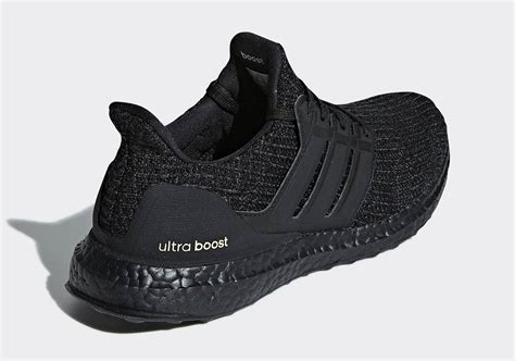 Finishing things off is a white boost midsole and black cont adidas Ultra Boost Black Gold F36123 Release Date | SneakerNews.com