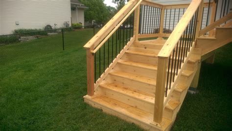 At 12' out, the deck will probably be about 14 high or more, requiring most likely a single step. Deck Stairs Minneapolis - Carter Custom Construction