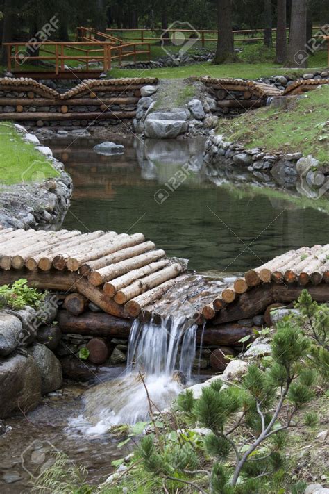 Small Dams Of Wood On A Mountain Stream Stock Photo 15085908