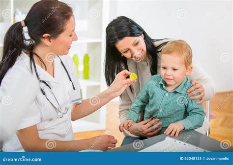 Young Woman And Her Child At The Doctor Homeopaths Stock Photo Image