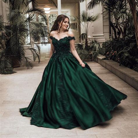 Unique wedding dresses with color are guaranteed to make a statement, but patterned wedding dresses take the drama one step further. Gorgeous Lace Flower Beaded V-neck Emerald Green Prom ...