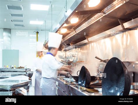 Motion Chefs Of A Restaurant Kitchen Stock Photo Alamy