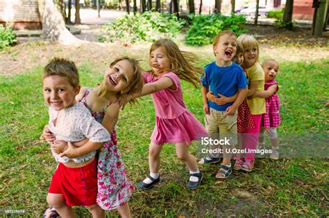 Cute Children Playing At Park Stock Photo And More Pictures Of 2 3 Years