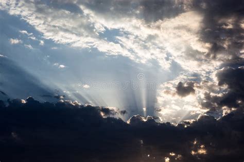 Cloudscape With The Sun Rays Radiating From Behind The Cloud Stock