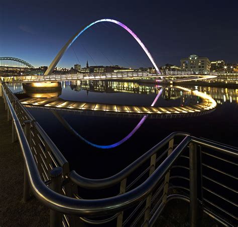 A View Of The Millennium Bridge At Dusk Reflected In The Ruiver Tyne