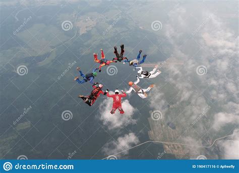 Formation Skydiving A Group Of Skydivers Are In The Sky Stock Photo