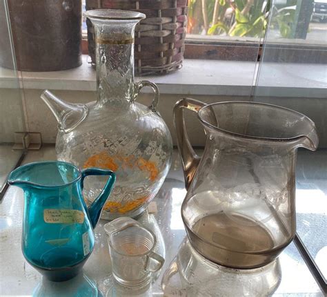 Lot A Collection Of Glass Jugs