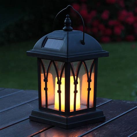 Our patio lights come in a variety of shapes and sizes to meet your needs. Black Solar Candle Lantern 27cm