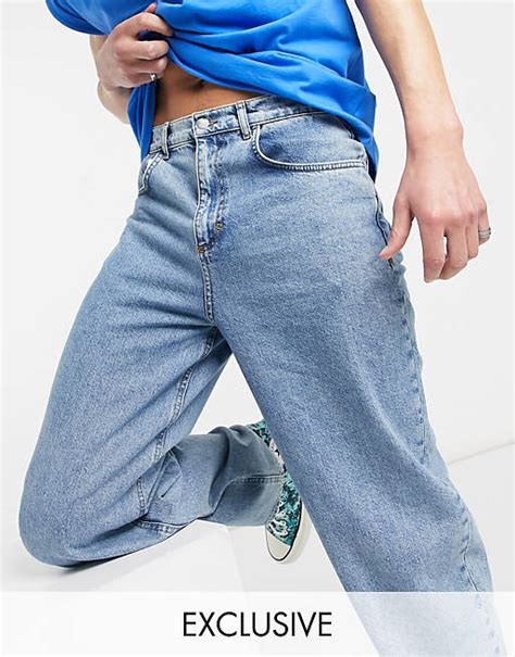 reclaimed vintage inspired baggy jeans im stil der 90er in mittelblauer stone waschung mblue