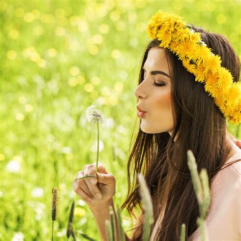 Beautiful Young Woman Blowing A Dandelion Stock Photo Image Of Cute