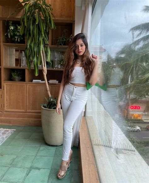 Jannat Zubair Looks Like A Badass In A White Tube Top And High Waisted Jeans With The Baguette