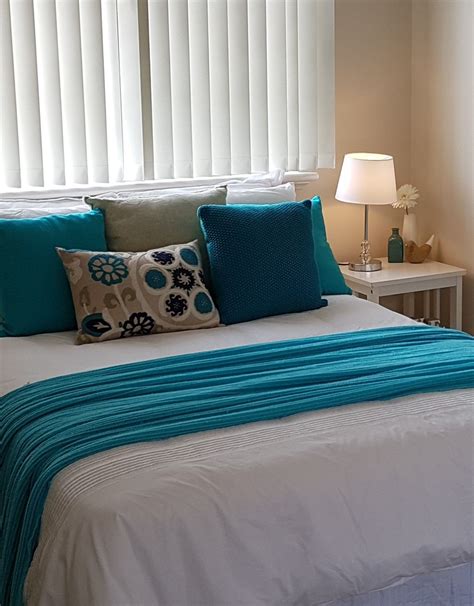 Staging a master bedroom for sale. Master bedroom - teal on white. | Home staging, Master ...