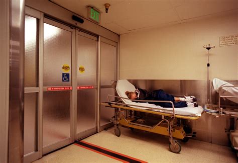 Person In Hospital Bed
