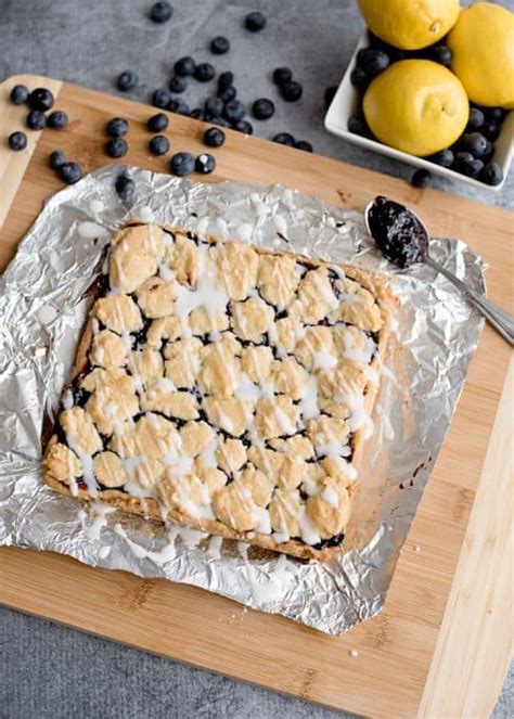 In this video i will be using famowoods glaze coat on a island top bar top epoxy is a great way to put a high gloss finish on a. glaze-on-top-of-blueberry-lemon-bars - All She Cooks