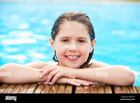 Two Young Girls Jumping Pool Hi Res Stock Photography And Images Alamy