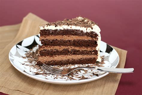 Sprinkle cocoa nibs and freeze dried strawberries on top. Chocolate layer-mousse cake with Cognac | Food & Style