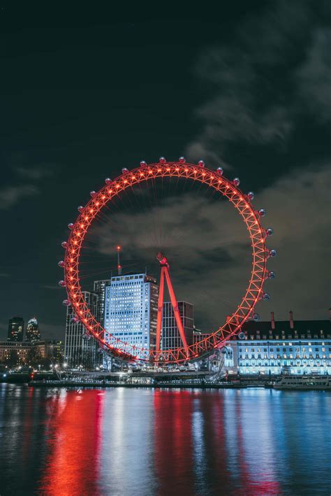 Download London Eye By The River Thames Wallpaper
