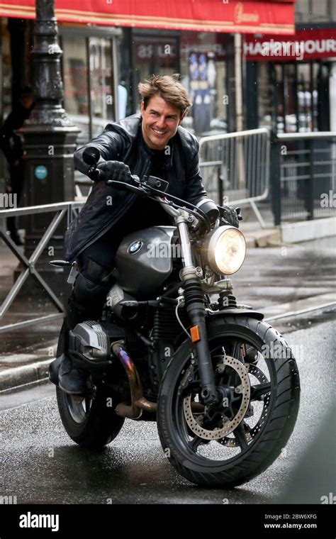 Tom Cruise Riding Motorbike In Front Of Crowd Filming Mission Impossible In Paris France