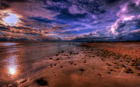 Sea Coast Beach Stone Sky With White And Dark Clouds