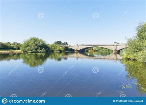 A Flat Calm River Trent Flowing Under Gunthorpe Bridge Stock Photo