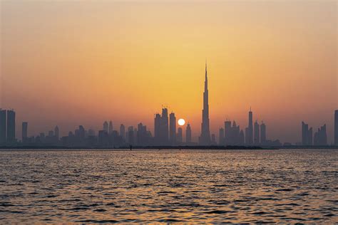 City Skyline With The Setting Sun Dubai Uae Photograph By Manuel