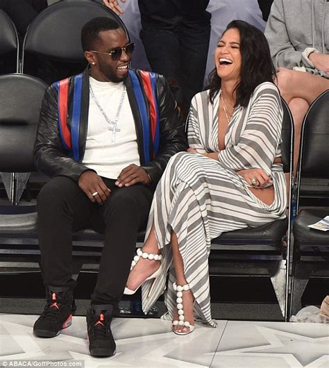Diddy Cuddles Cassie As She Flashes Thigh At La Nba Game Daily Mail Online