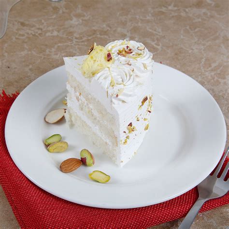 Yes, its a hybrid or you can say the fusion of cake and sweet. Vanilla Flavored Pista Rasmalai Cake Half kg | Gift ...
