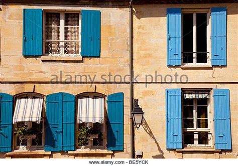 Windows And Blue Shutters Homes In Arles Provence France Stock