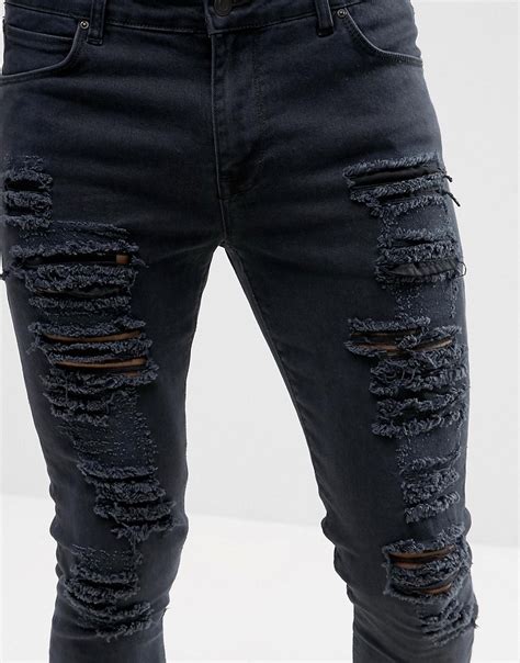 Asos Asos Super Skinny Jeans With Extreme Rips At Asos