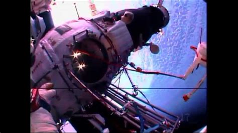 cosmonauts throw nanosatellite during spacewalk video youtube