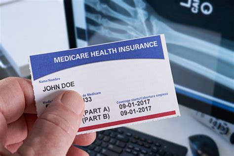 Use our easy tool to. Medicare Health Insurance Card In Medical Office With Xray And Hand Holding Stock Photo & More ...