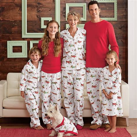 These snuggly sleepwear options allow each family member (including your furry friends!) to share a similar look that's perfect for celebrating. Santa's Helpers Family Pajamas | Family pajama sets ...