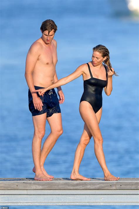 Sienna Miller Shows Off Her Toned Figure In A Black Bikini As She