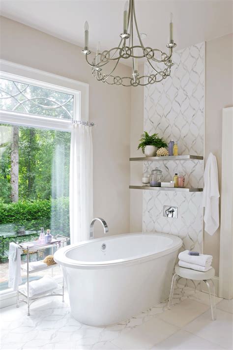 A Beige And White Bathroom Is Ideal When Pairing With A Backyard View